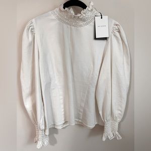 Oversized white blouse from “En Saison”